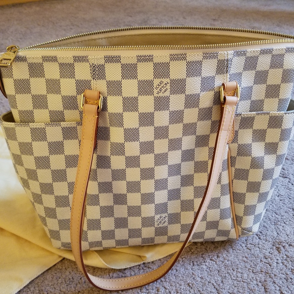 authentic never used Louis Vuitton tote